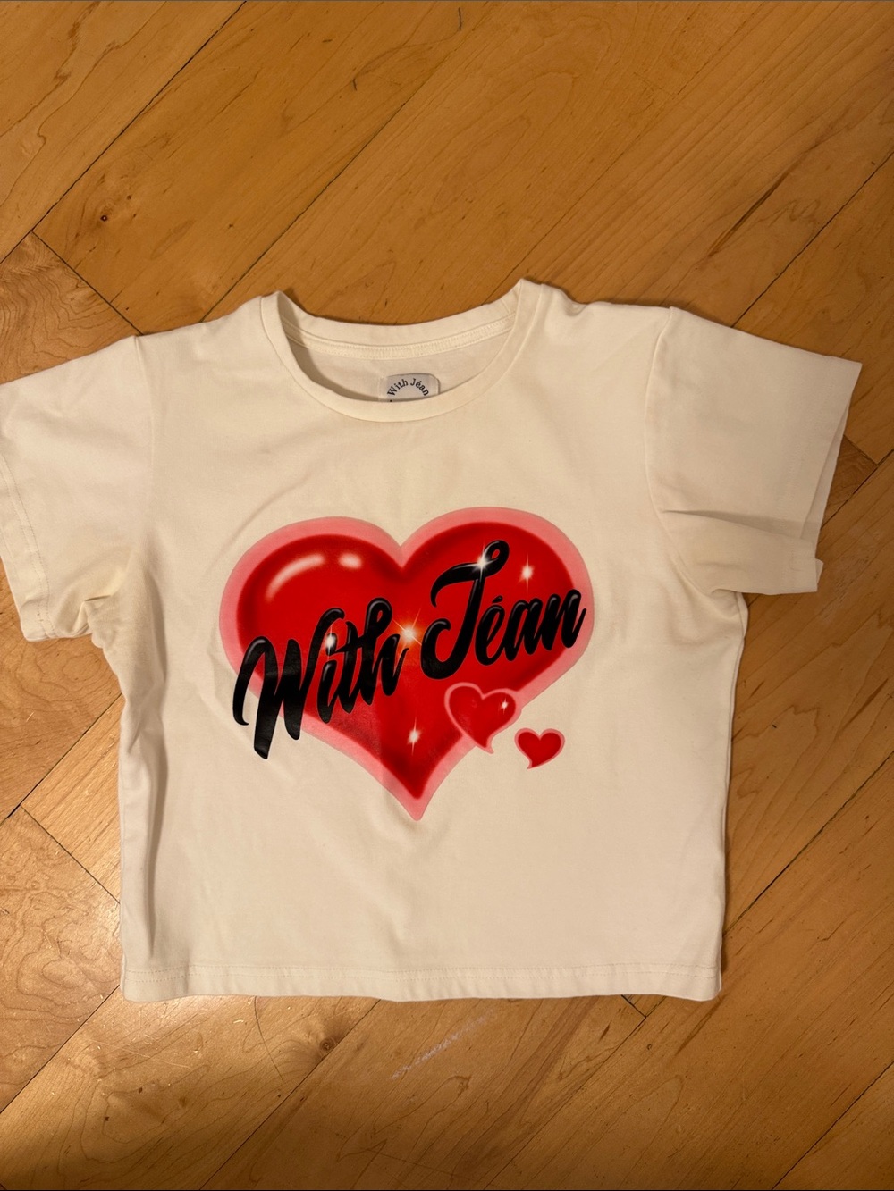 With Jean Cream Tee with Red Heart Graphic